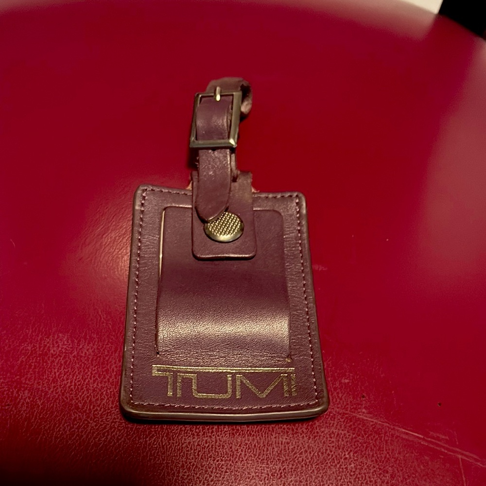 TUMI luggage tag